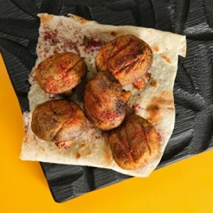 Грибы шампиньоны на углях