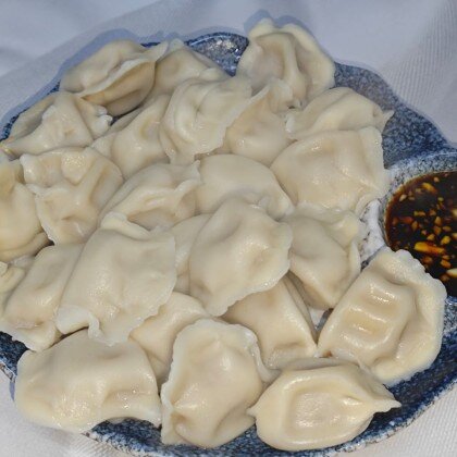 97. Пельмени с черемшой и свининой отварные