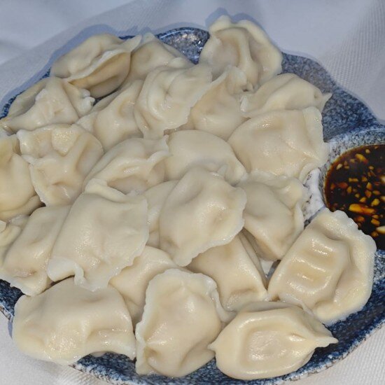 97. Пельмени с черемшой и свининой отварные