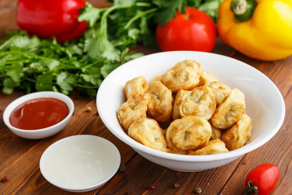 Пельмени с зеленью жаренные